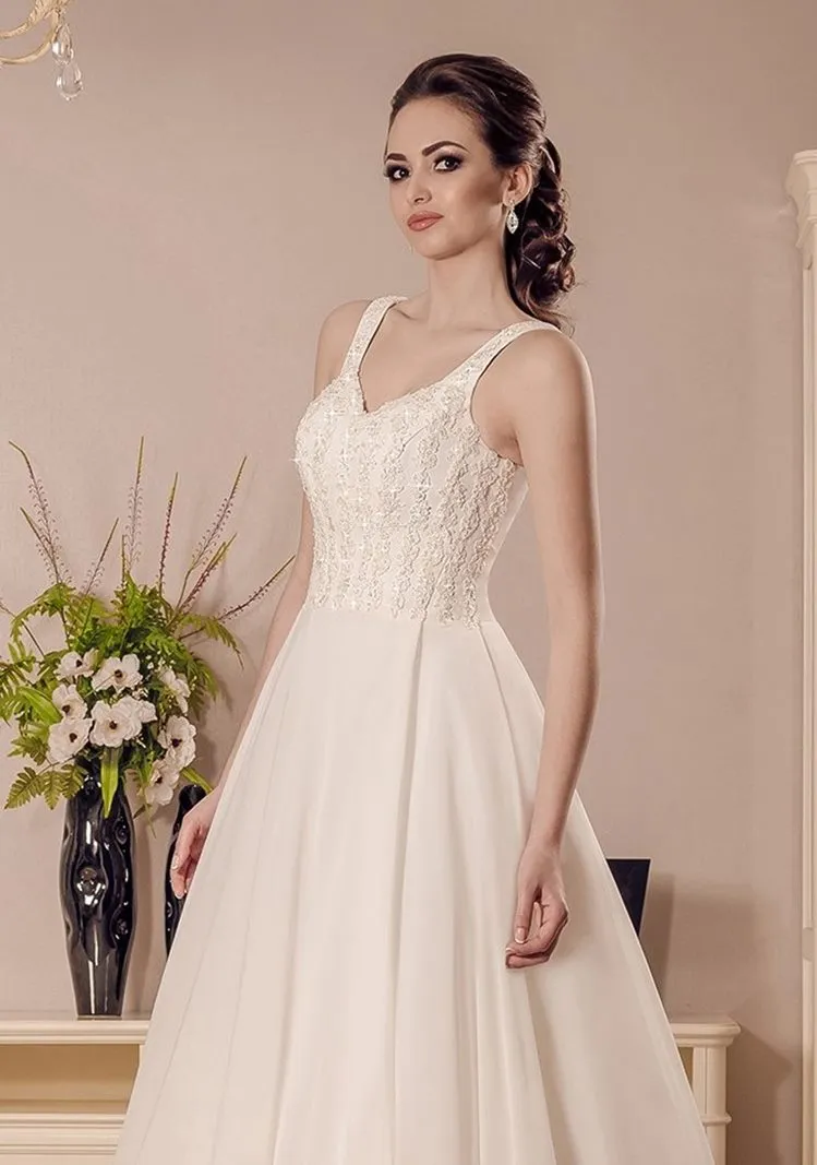 ---A line style tailored wedding dress with clean line with straps and V-neck, bodice decorated with lace and beads, wide organz