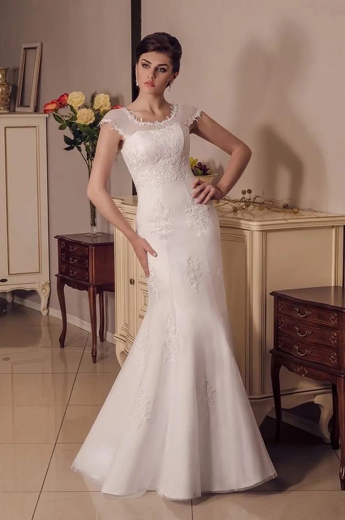 ---Elegant mermaid-style wedding dress from the new 2021 collection with transparent straps--