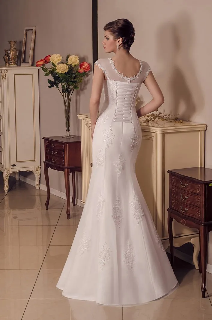 ---Elegant mermaid-style wedding dress from the new 2021 collection with transparent straps--