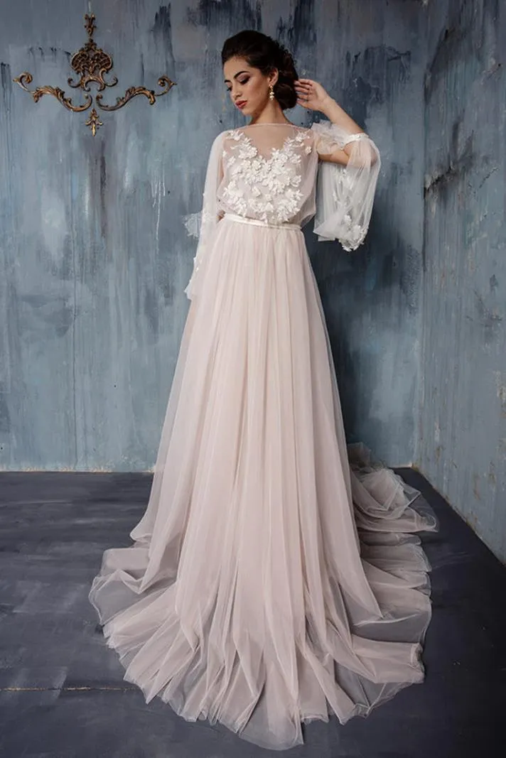 ---Tulle wedding dress with long puff sleeves and bodice decorated with fabric flowers--