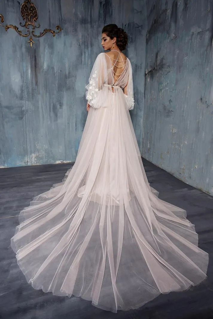 ---Tulle wedding dress with long puff sleeves and bodice decorated with fabric flowers--